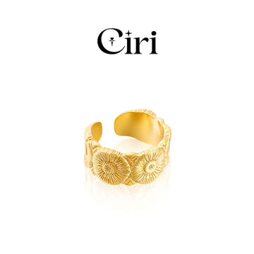 Gold-colored floral design ring