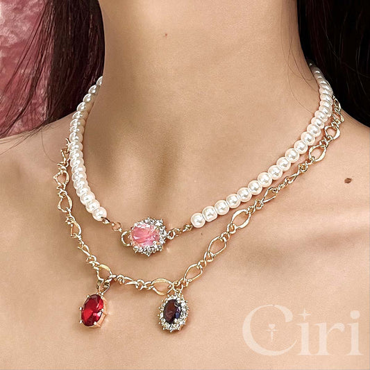 A choker of red-purple gemstones necklaces & A pearl-pink  gemstones chokers